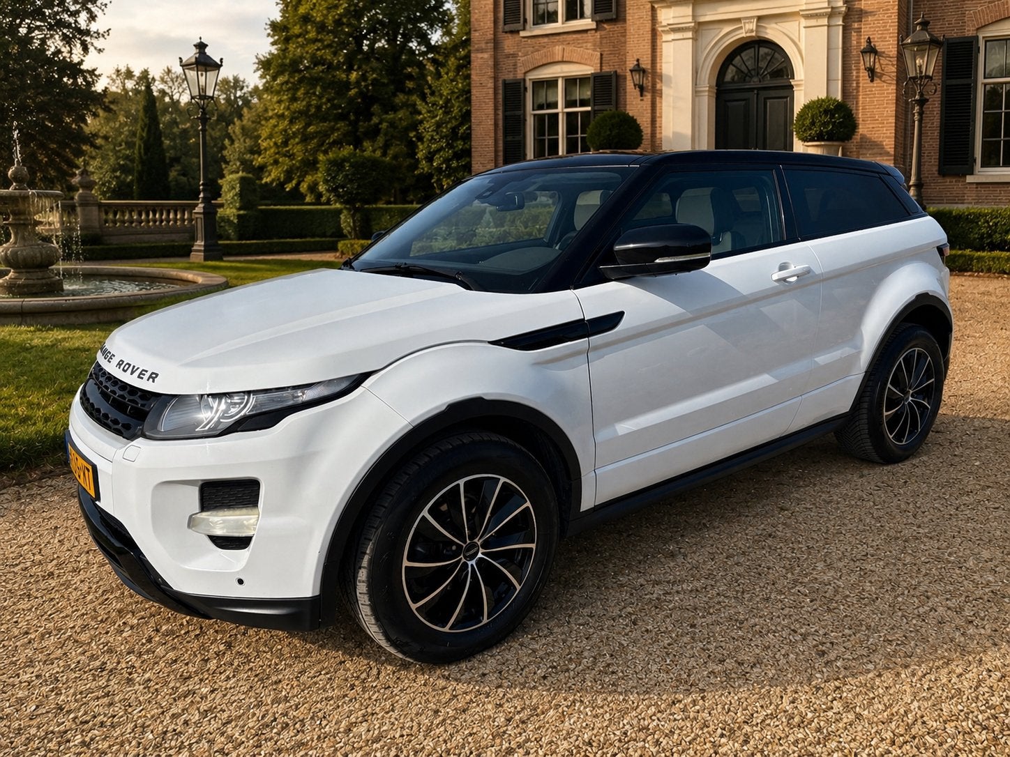 Range Rover Evoque coupe wit 2012  2.2 SD4 4x4 Automaat, Auto's, Automaat, USB, 750 kg, 4 stoelen