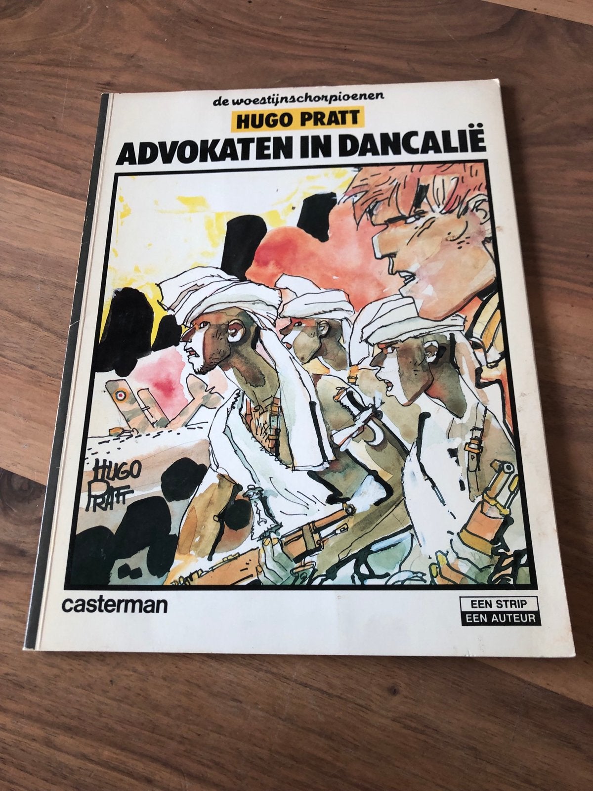 Hugo Pratt - Advocaten in Dancalië (De Woestijnschorpioenen), Boeken, Stripboeken, Eén stripboek, Ophalen of Verzenden, Gelezen
