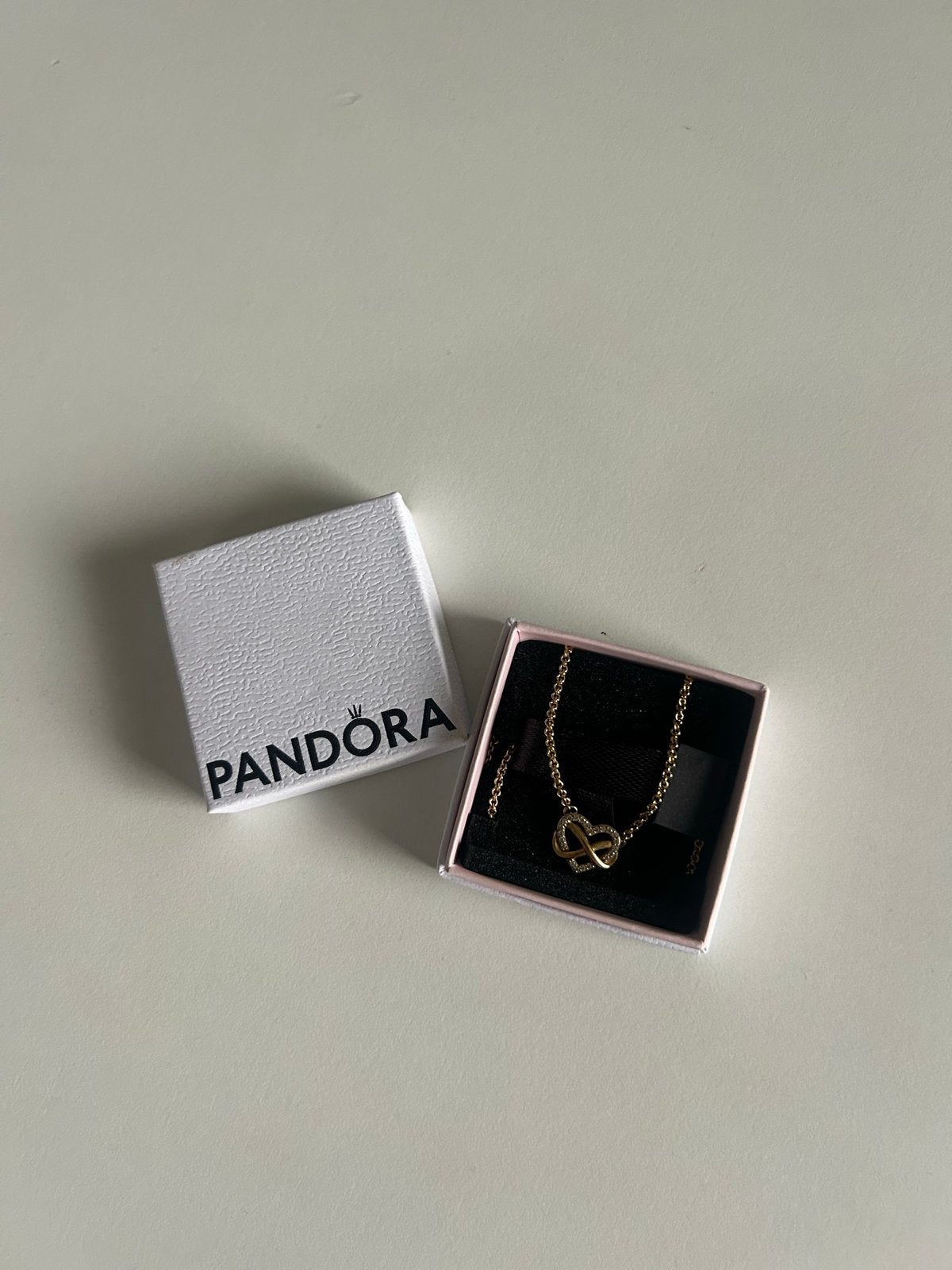 Pandora Gouden Ketting met Hart en Oneindigheidssymbool, Met kristal, Nieuw, Ophalen of Verzenden, Goud