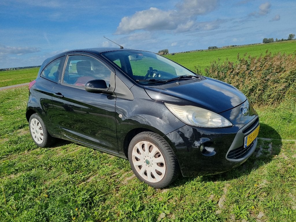 Ford Ka 1.2 51KW 2009 Zwart, Auto's, Voorwielaandrijving, Stof, 1242 cc, 4 cilinders