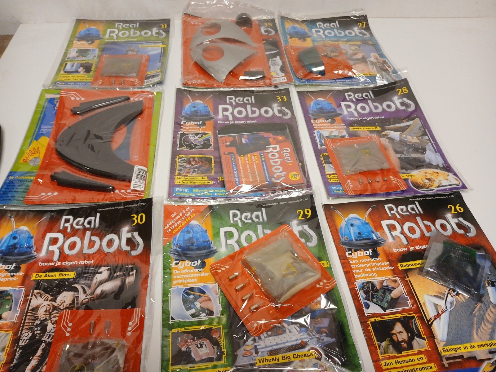 Real robots bouw je eigen robot 9 delen nieuw, Ophalen of Verzenden, Groter dan 1:32, Overige merken