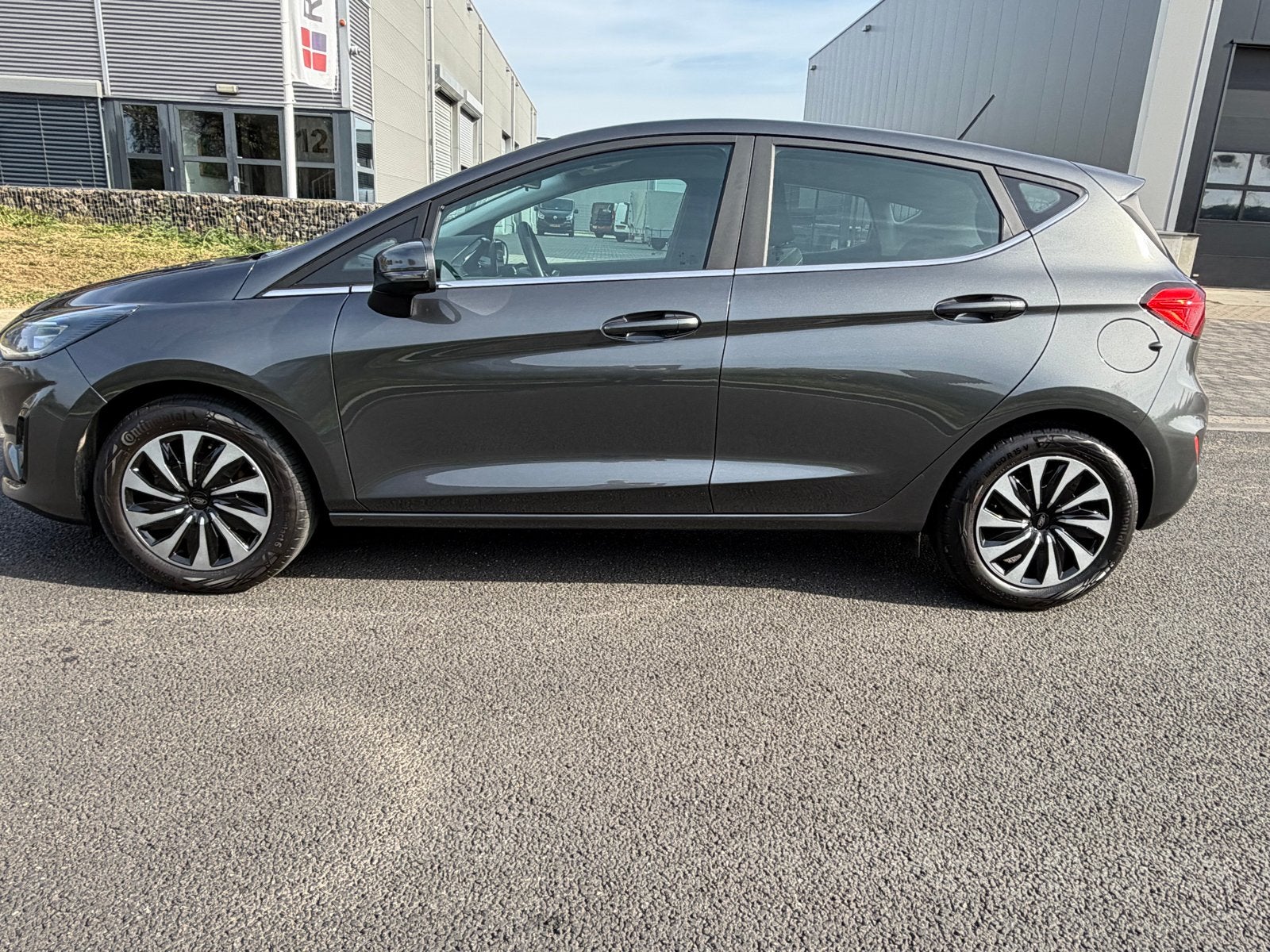 Foto 4 van Ford Fiësta 1.0 Ecoboost Hybrid Titanium 125pk 2023 Grijs