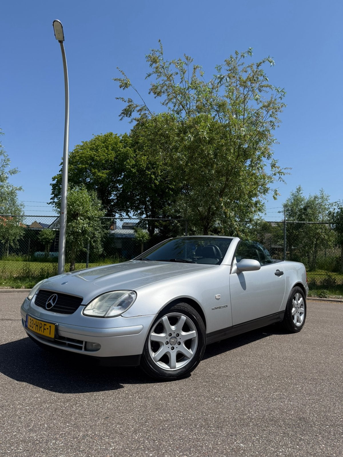 Mercedes-Benz SLK 230 2000 Grijs Met nieuwe apk tot 13/06/27, Auto's, Automaat, Stoelverwarming, Cabriolet, SLK