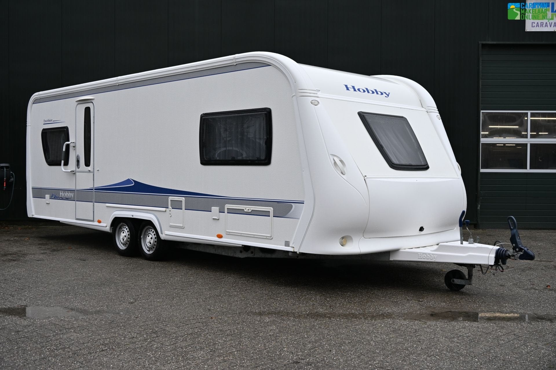 Hobby Excelsior 650, Caravans en Kamperen, Rondzit, Hobby, 7 tot 8 meter, Bedrijf