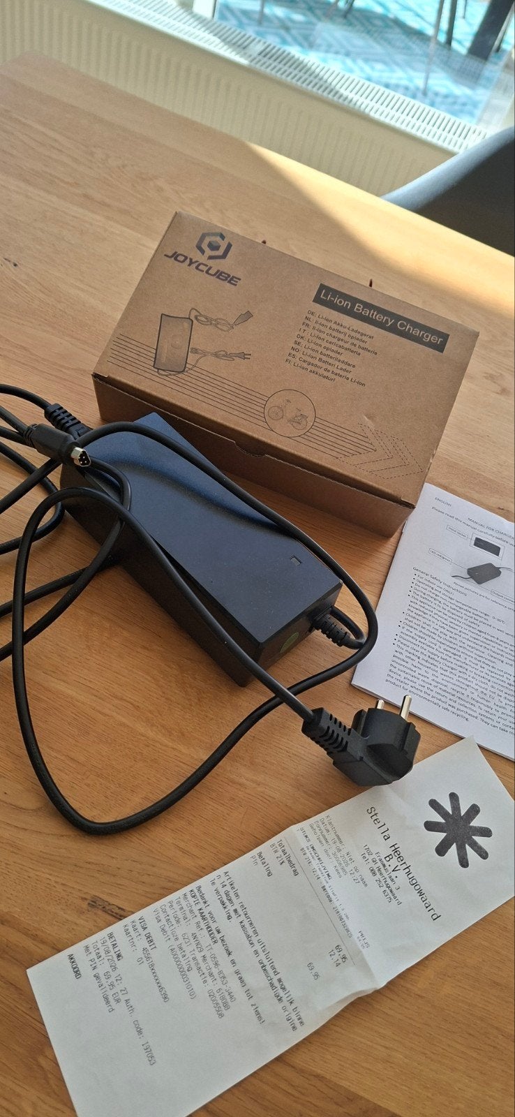Stella Joycube Li-ion Acculader 42V 2A voor E-bikes (5-polig, Zo goed als nieuw