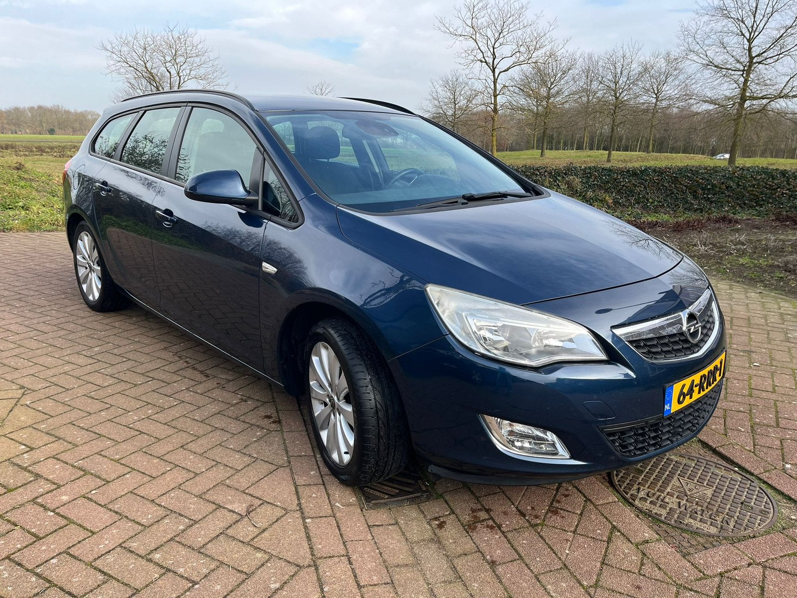 Opel Astra station 1.4 Turbo SPORTS TOURER uit 2011, Auto's, Voorwielaandrijving, 4 cilinders, Blauw, 1337 kg