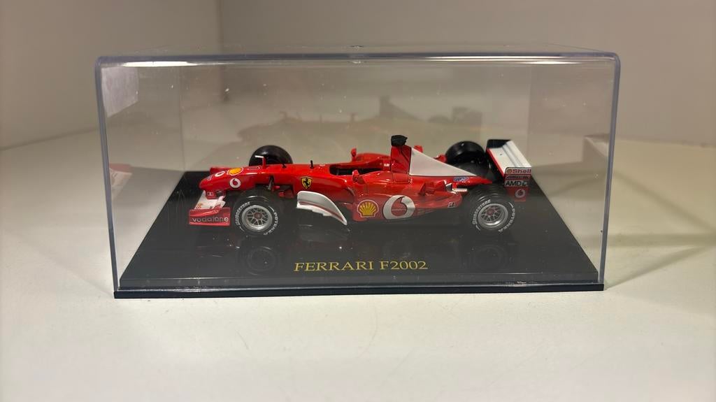 Ferrari f2002 atlas 1.43, Hobby en Vrije tijd, Modelauto's | 1:43, Overige merken, Auto, Ophalen of Verzenden, A