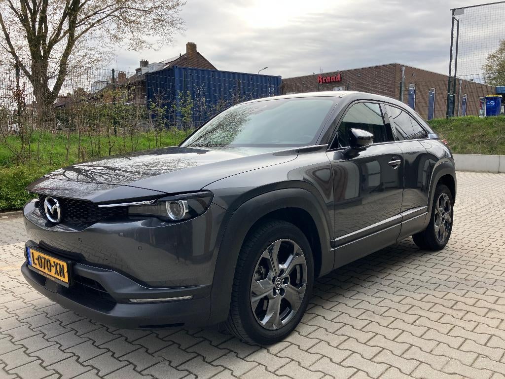 Mazda MX-30 E-skyactiv 145pk Aut 2021 Grijs, Auto's, Mazda, 35 kWh, Origineel Nederlands, 39 min, 108 pk