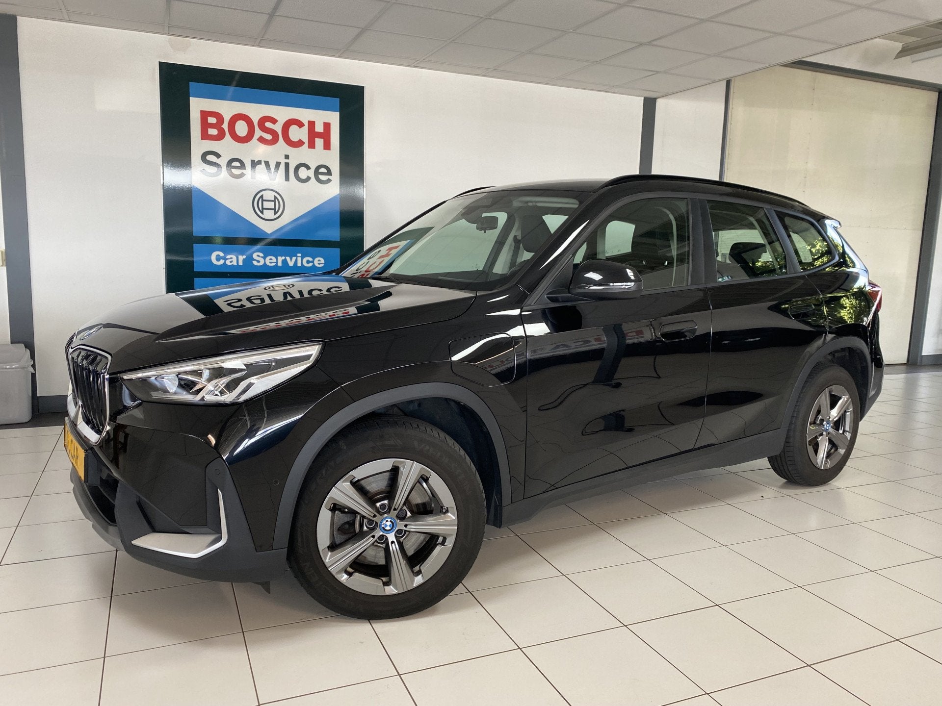 BMW X1 25 E x Drive Leer / Carplay / Elec achterklep / Camer, 12 maanden, Gebruikt, Zwart, Zwart