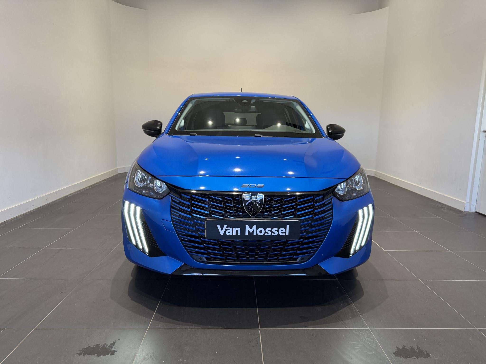 Peugeot e-208 E-Style | Stoelverwarming | Apple Carplay & An, 12 maanden, Blauw, Leder en Stof, Origineel Nederlands