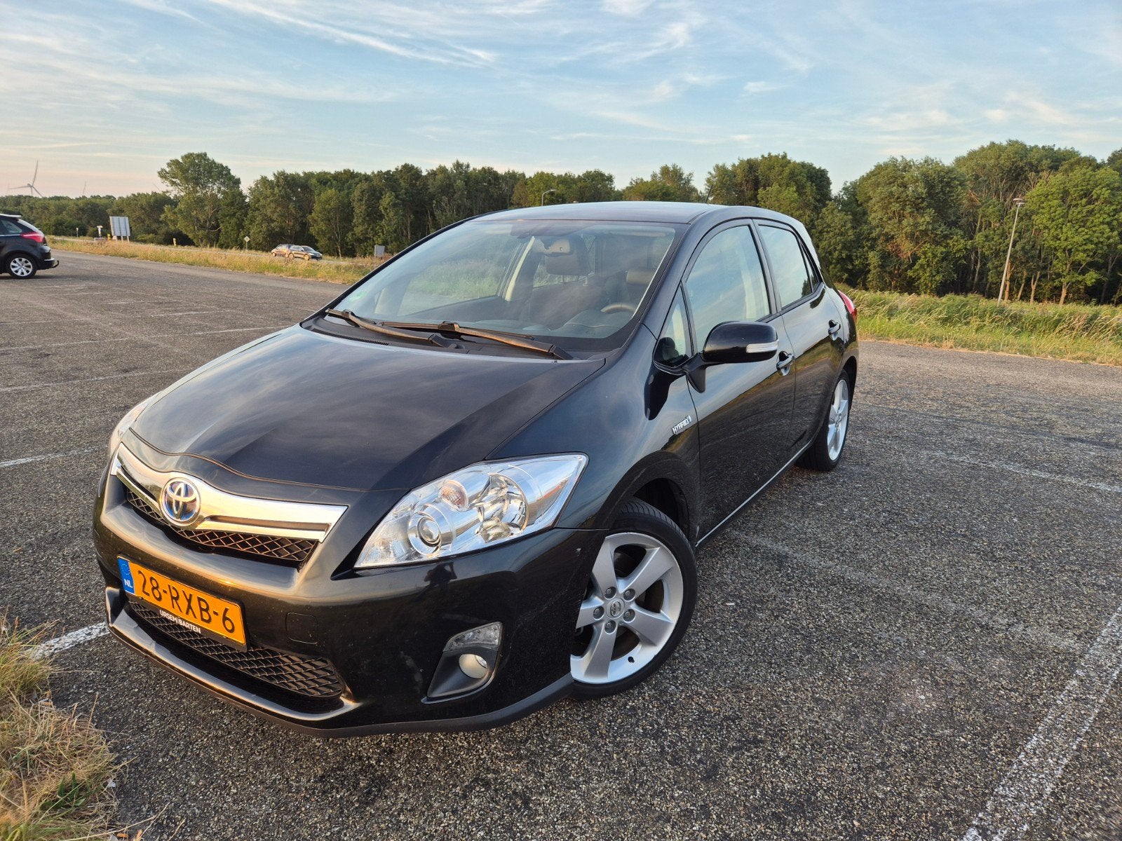 Toyota Auris 1.8 Full Hybrid 5DR CVT 2011 Zwart, Auto's, Toyota, 4 cilinders, Zwart, 75 €/maand, 1798 cc