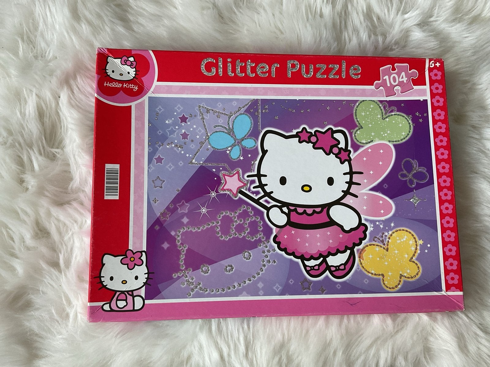 Hello Kitty Glitter Puzzel 104 stukjes, Kinderen en Baby's, Verzenden, Meer dan 50 stukjes, Zo goed als nieuw, 6 jaar of ouder