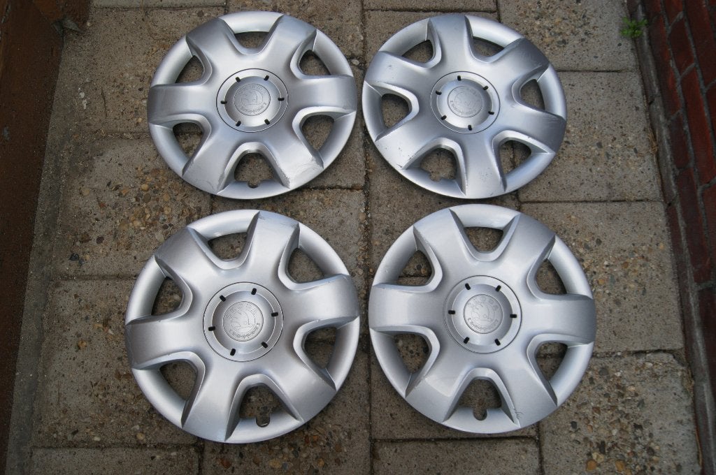 Set van 4 originele wieldoppen Skoda Roomster 15 inch, Ophalen of Verzenden, Gebruikt