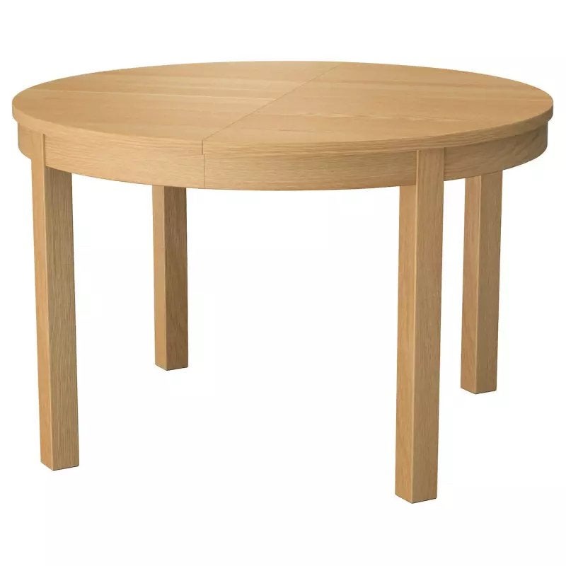 Ronde uitschuifbare eettafel van licht eikenhout