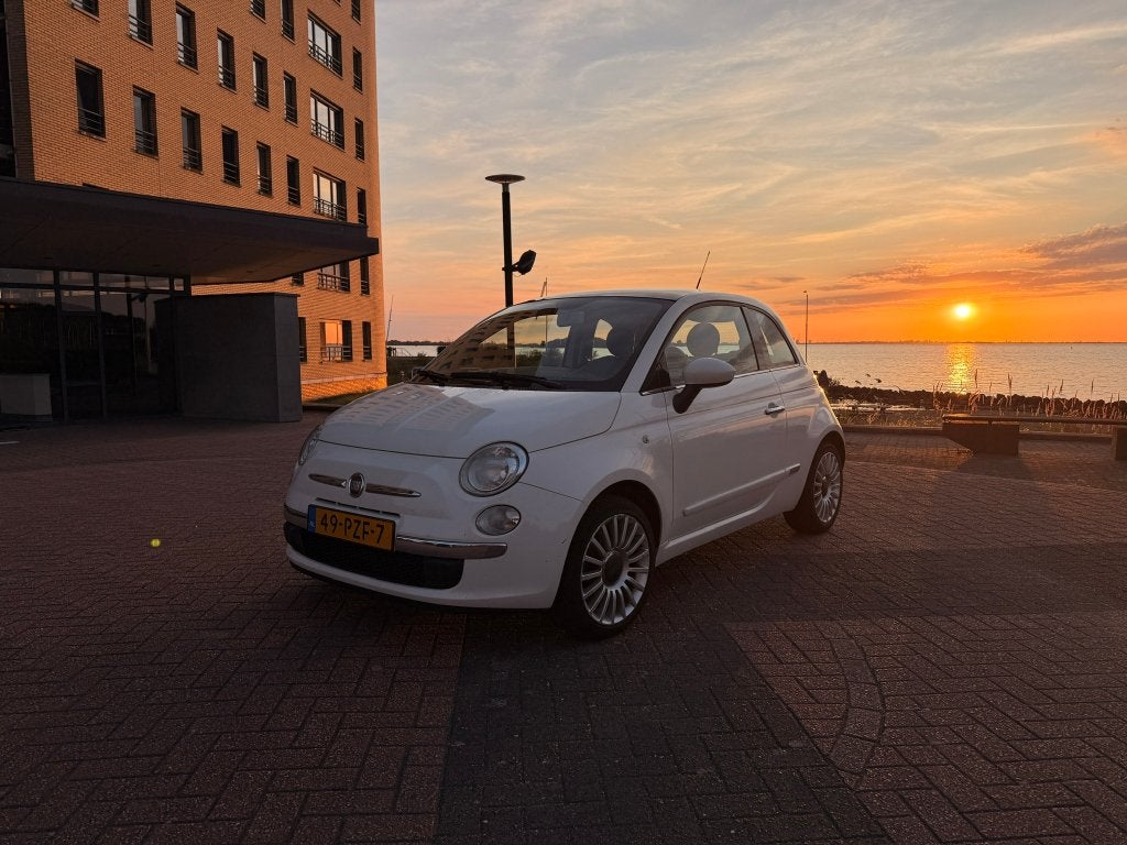 Fiat 500 1.2 Lounge Automaat | Panoramadak | Airco | Leder, 4 cilinders, Leder en Stof, Wit, Origineel Nederlands