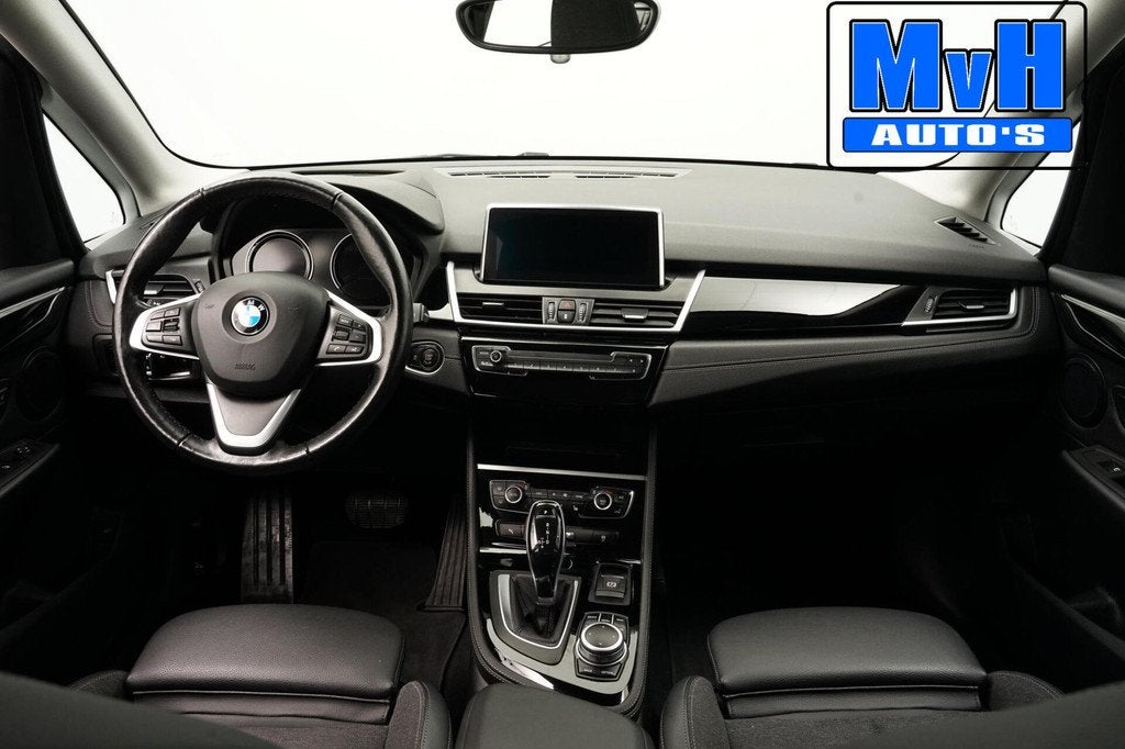 BMW 2-serie Active Tourer 218i Business Edition|SPORTSTOEL, 136 pk, Gebruikt, Euro 6, Leder en Stof