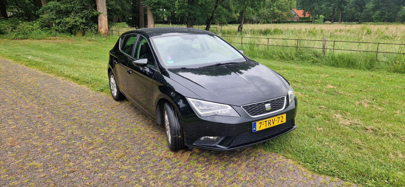 Seat Leon 1.2 TSI 77KW/105PK 2014 Zwart, Auto's, Voorwielaandrijving, Stof, Zwart, 4 cilinders