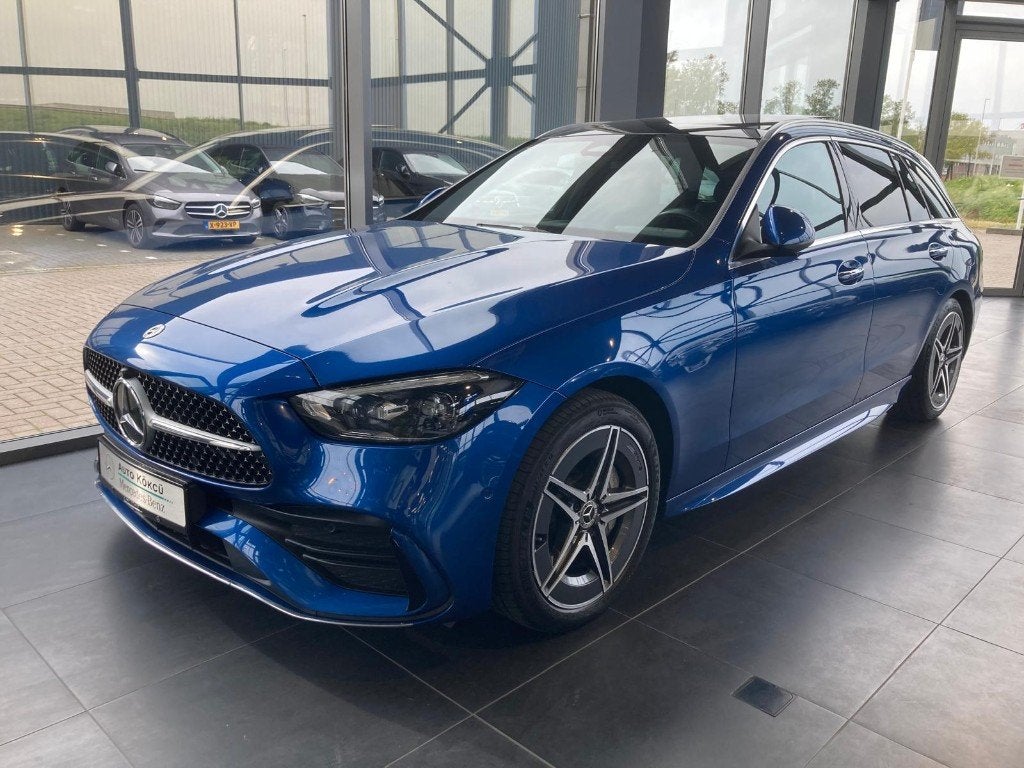 Mercedes-Benz C-Klasse C300  Hybrid 313pk 9G-AMG, PANO, Automaat, Achterwielaandrijving, 1800 kg, Blauw