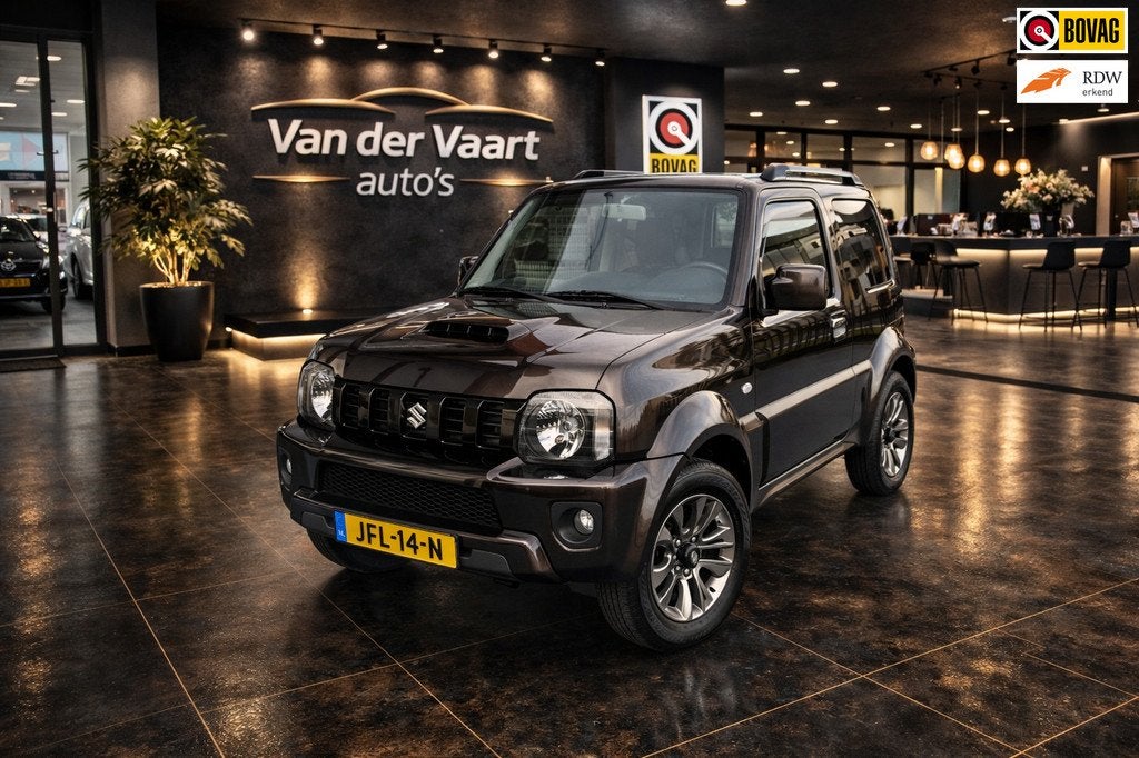 Suzuki JIMNY 1.3 Exclusive 4X4 LEDER STOELVERWARMING AIRCO L, Auto's, Euro 5, Gebruikt, Bruin, 4 stoelen