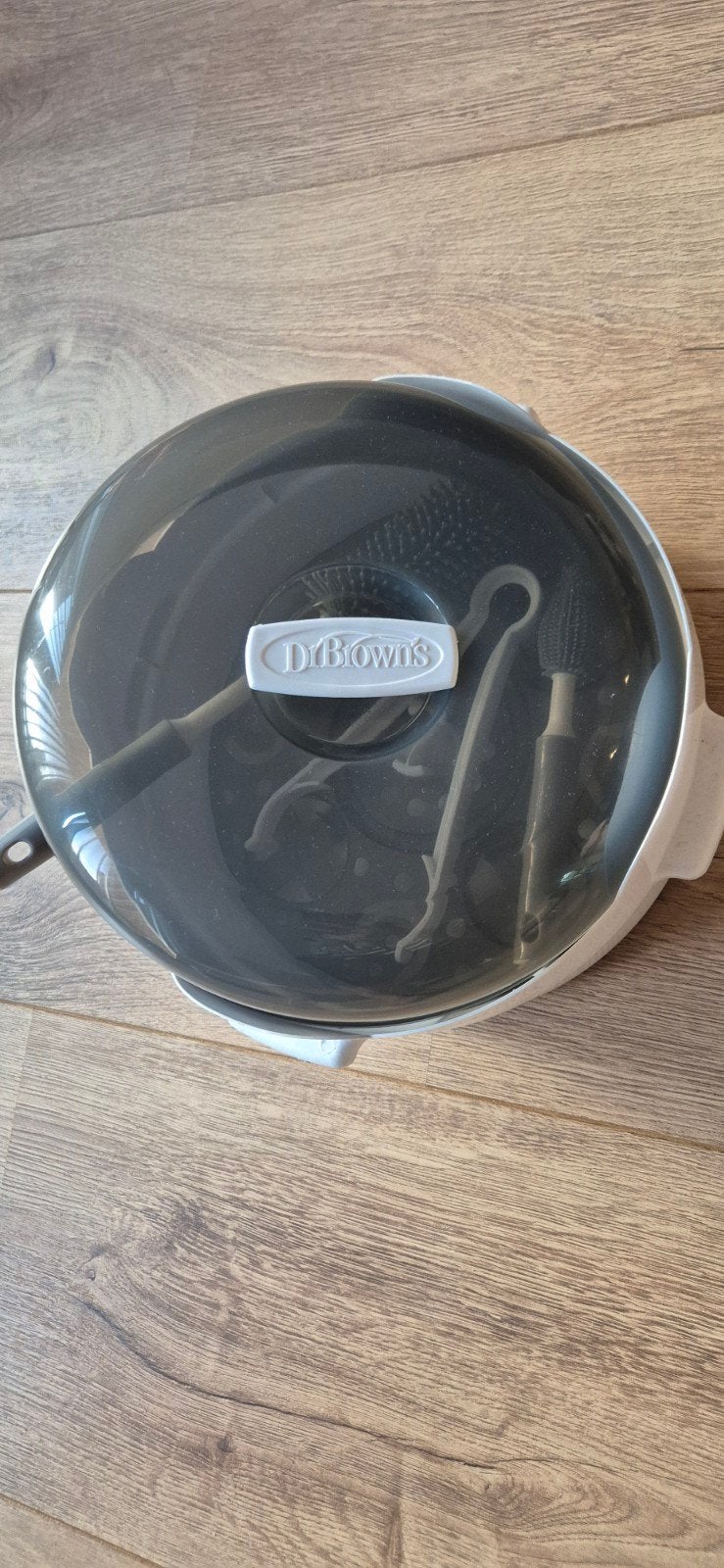 Dr. Brown's Magnetronsterilisator voor babyflessen, Ophalen