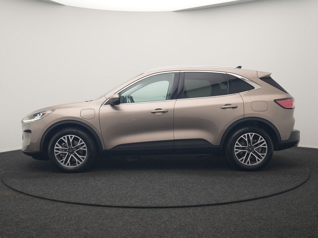 Ford Kuga 2.5 Titanium PHEV 225pk Dealer O.H. | Adaptive Cru, Auto's, Ford, Stof, Gebruikt, 4 cilinders, Parkeersensor