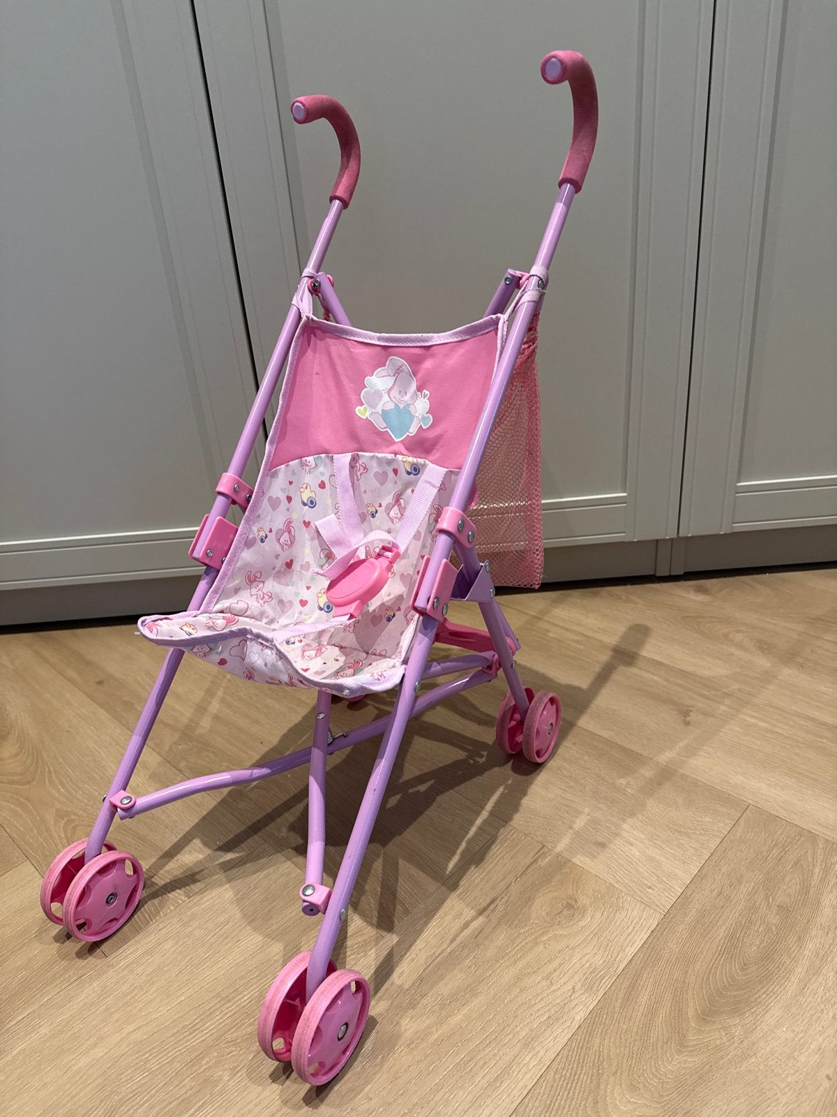 Roze poppenbuggy voor baby- of speelpoppen, Kinderen en Baby's, Ophalen of Verzenden, Gebruikt, Babypop