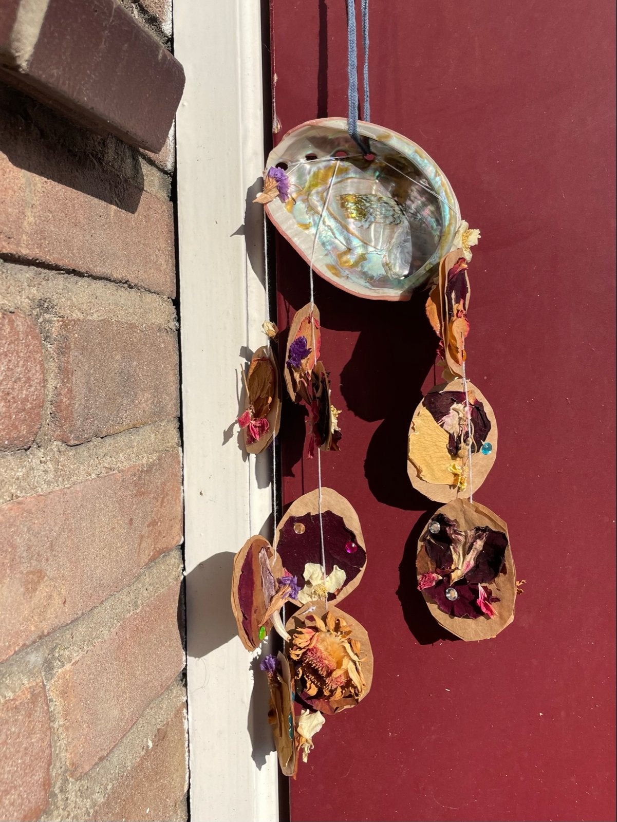 Handgemaakte ornament met schelp en gedroogde bloemen, Ophalen