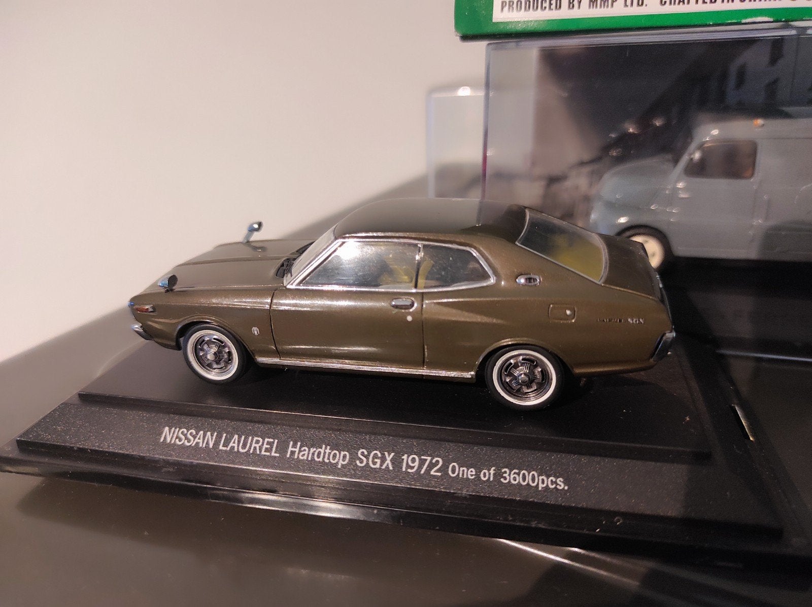 Nissan Laurel SGX 1972 groen EBBRO 1:43 in vitrinedoosje, Ophalen of Verzenden, Auto, Overige merken