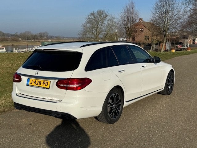 Mercedes-Benz C-Klasse Estate 200 Premium Plus (bj 2017), Auto's, Automaat, 4 cilinders, Leder en Stof, Wit