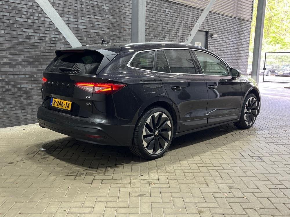 Skoda Enyaq iV 80 | Matrix LED | Camera | Stoel+Stuurverwarm, Auto's, Skoda, Achterwielaandrijving, Gebruikt, 80 kWh, Zwart