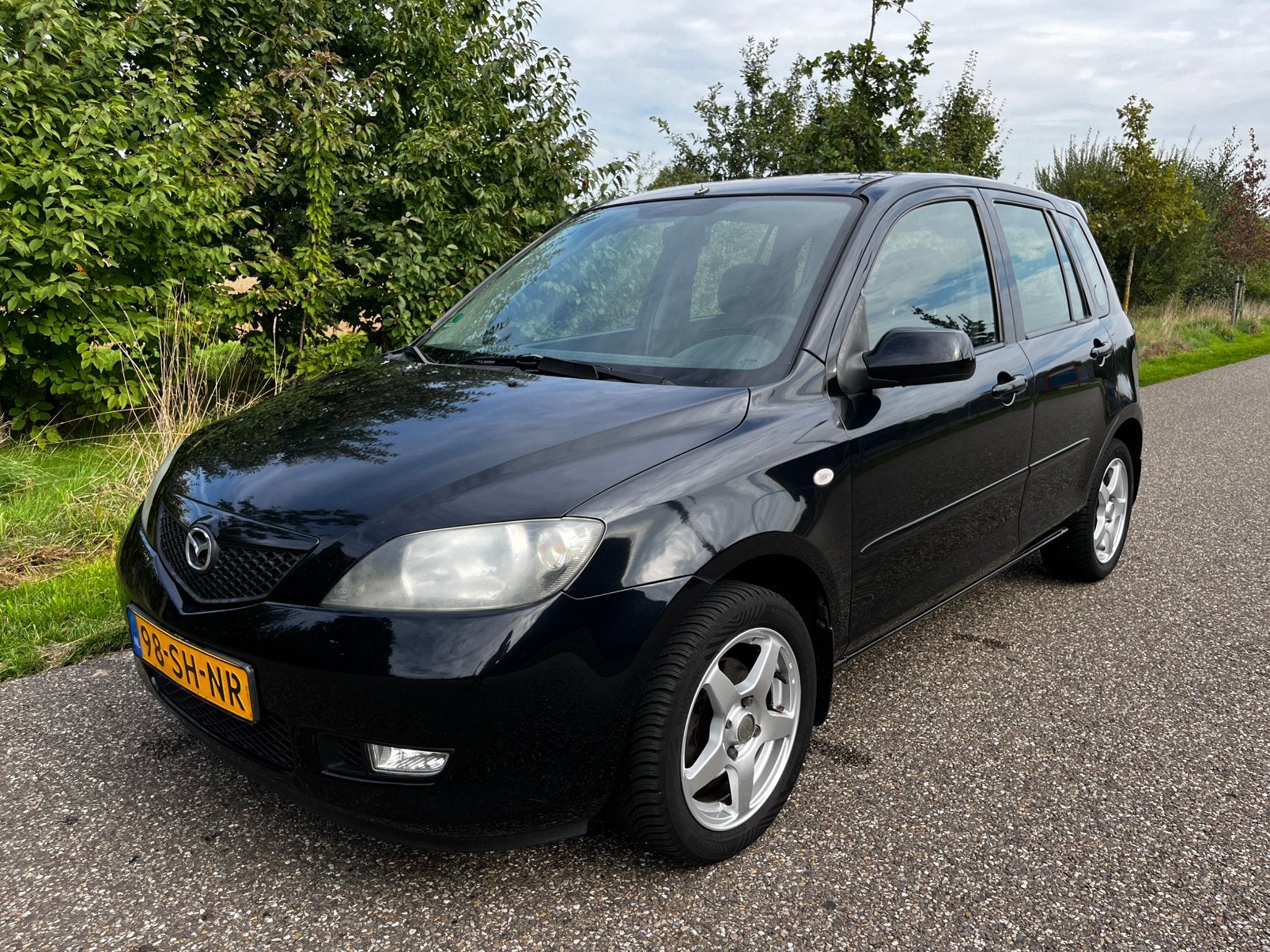 Mazda 2 1.6 16V Touring 2006 Zwart, Auto's, Voorwielaandrijving, 1596 cc, 4 cilinders, 100 pk