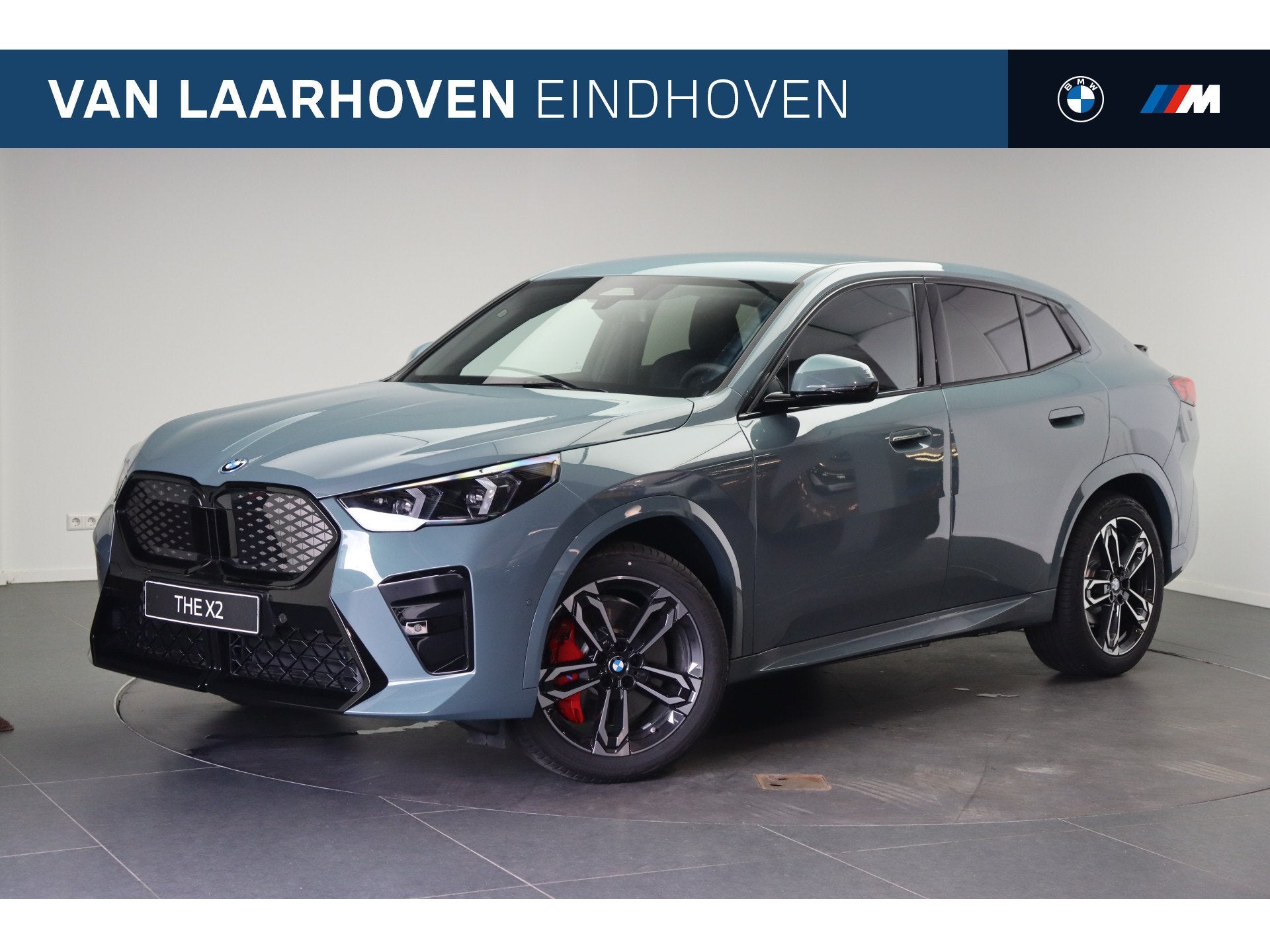 BMW iX2 eDrive20 M Sport / Sportstoelen / Achteruitrijcamera, Auto's, BMW, Dealer onderhouden, IX2, Zwart, Leder