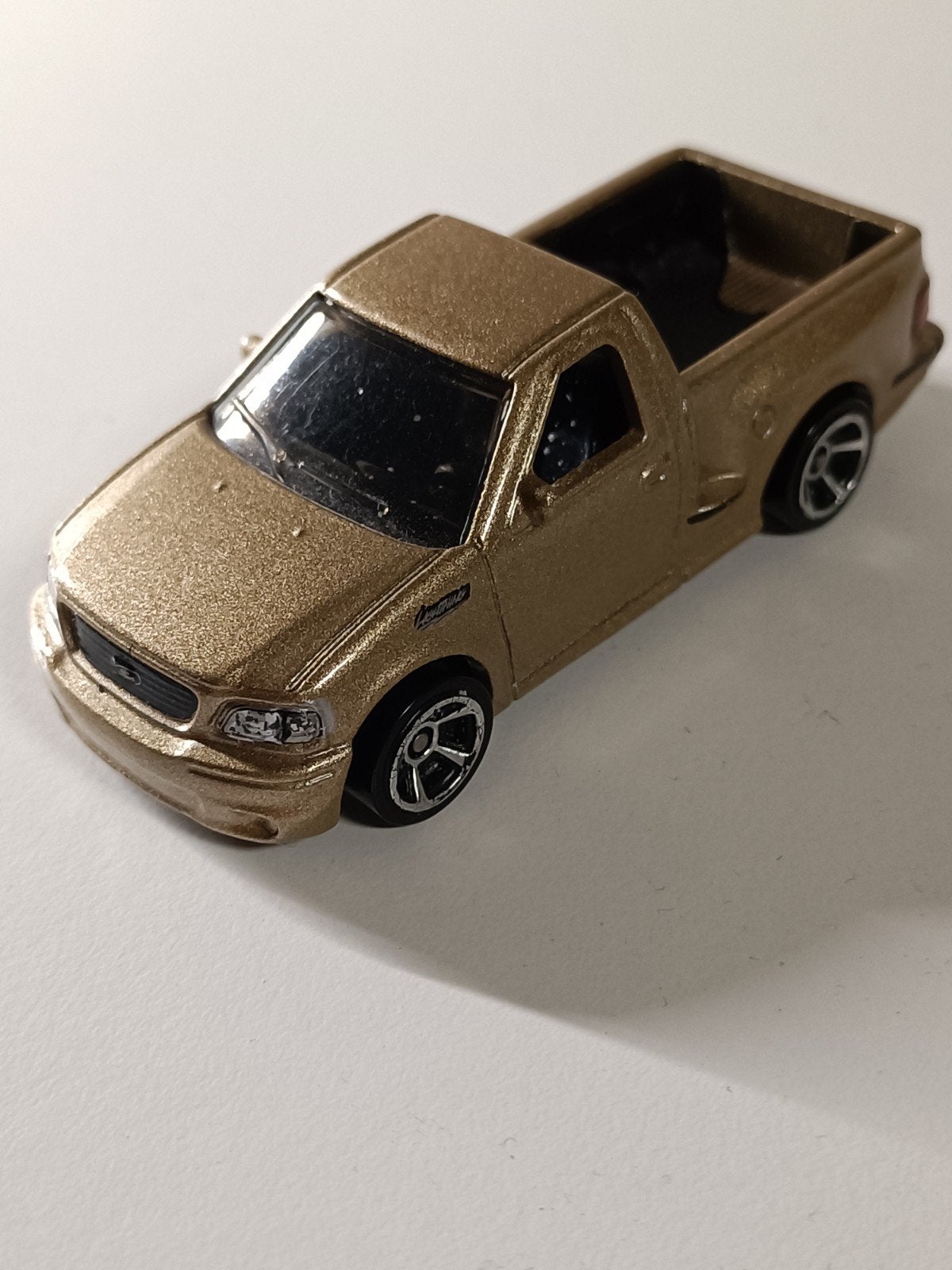 Hot Wheels Ford F-150 Lightning Goud, Ophalen of Verzenden, Zo goed als nieuw, Overige typen