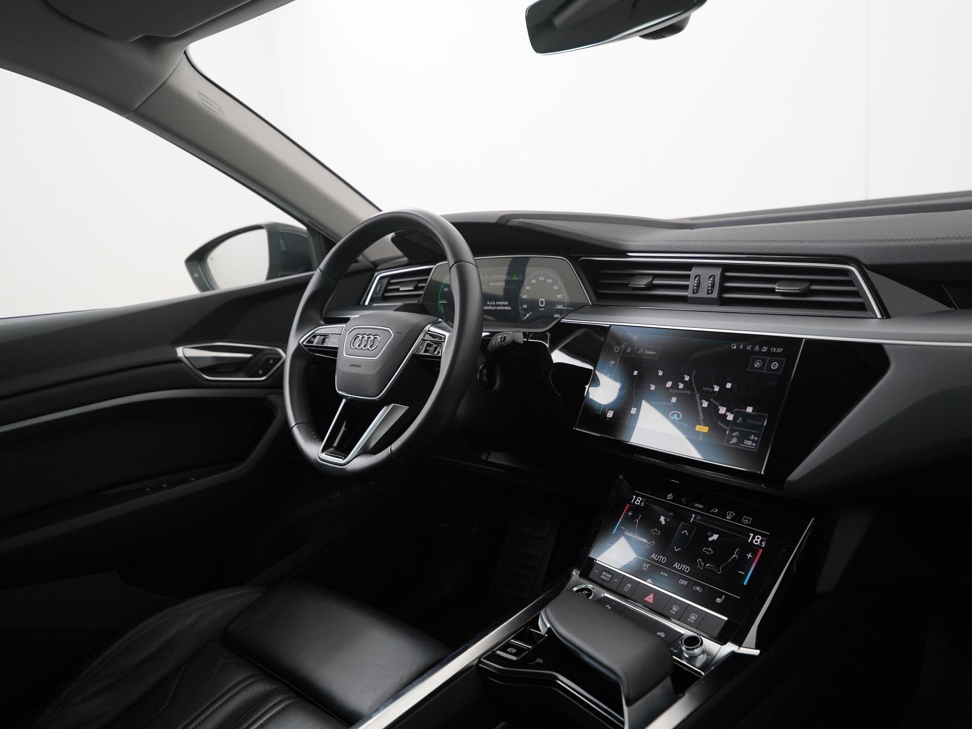 Audi e-tron Sportback 55 quattro Advanced Plus 95 kWh | SOH, Auto's, Automaat, 12 maanden, 95 kWh, Leder