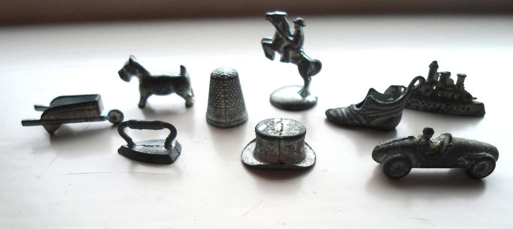 9 Metalen Monopoly speelstukjes / pionnen., Verzamelen, Speelgoed, Zo goed als nieuw, Ophalen of Verzenden