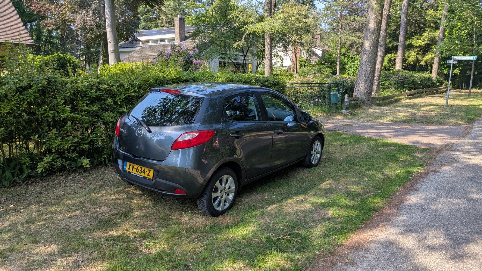 Mazda 2 1.3 55KW 5DRS 2010 Grijs, Auto's, Mazda, Voorwielaandrijving, Stof, 74 pk, 4 cilinders