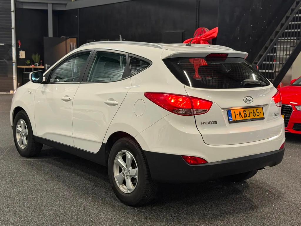Hyundai ix35 1.6i GDI Active AIRCO/NAVI/NW-KOPP € 6.290,00, Voorwielaandrijving, 1591 cc, 4 cilinders, Wit