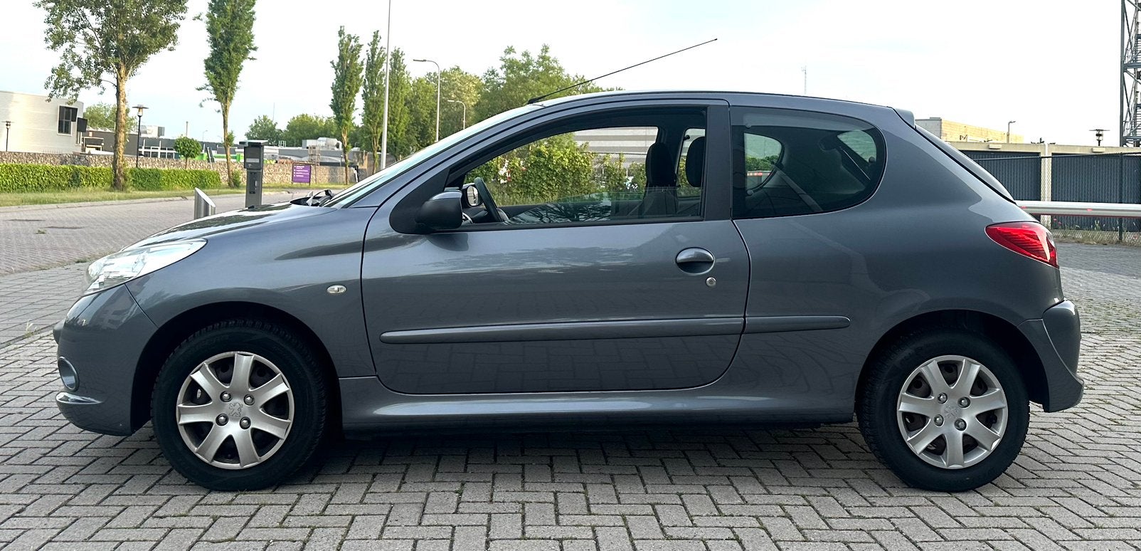 Peugeot 206+ 1.4 75 PK Airco/Cruisecontrol/Nap\Nieuw APK, Auto's, Peugeot, Voorwielaandrijving, 206+, Stof, 4 cilinders