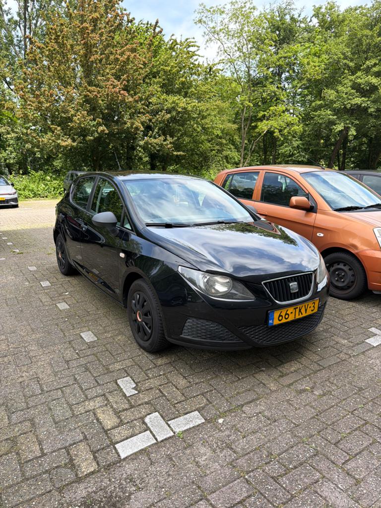 Seat Ibiza 1.2 44KW 3DRS 2012 Zwart, Voorwielaandrijving, Stof, 1198 cc, Origineel Nederlands