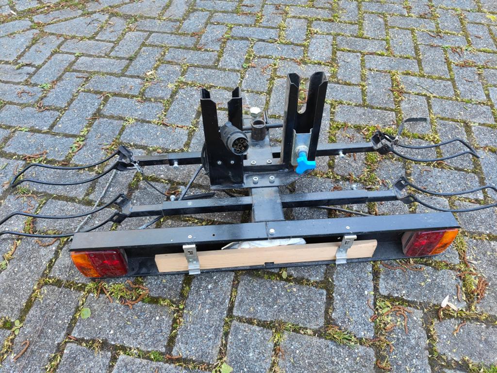 Fietsendrager., Ophalen