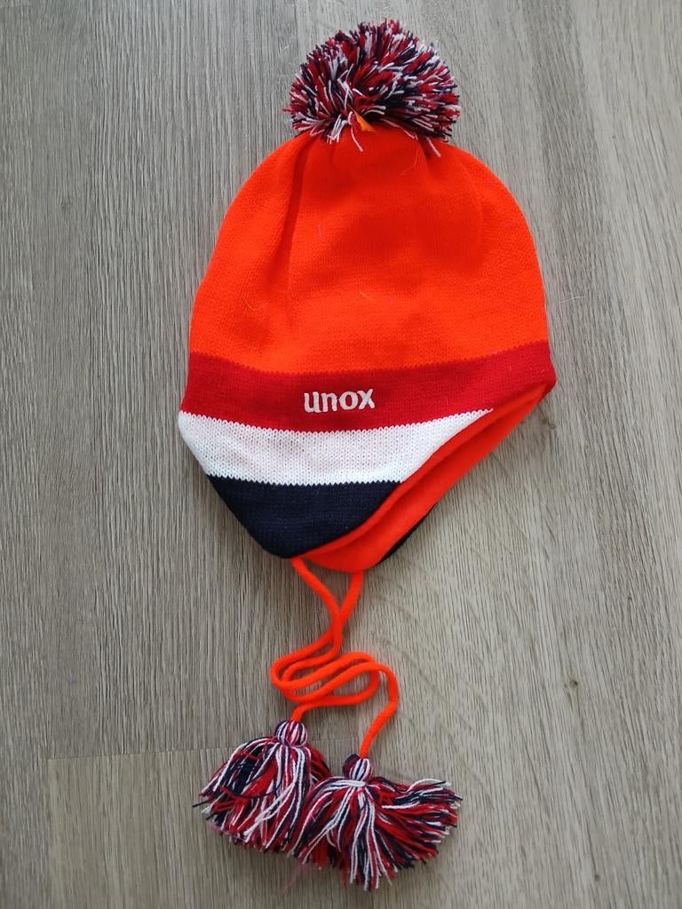 Unox Muts met Pompon en Kwastjes - Oranje/Rood/Wit/Blauw, Kleding | Dames, Mutsen, Sjaals en Handschoenen, Unox, Ophalen of Verzenden
