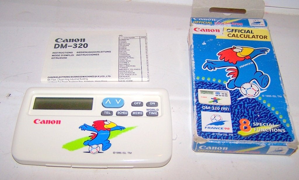 Canon DM-320 (W) Organizer/calculator-World Cup France 1998., Ophalen of Verzenden, Computers en Rekenmachines