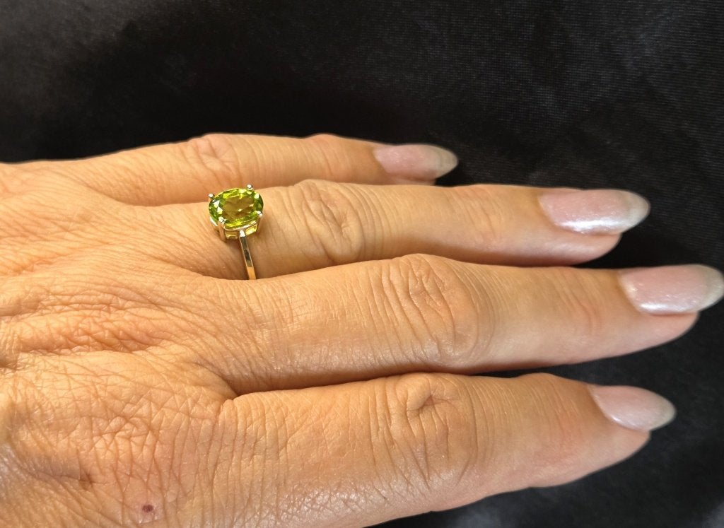 Gouden Vintage solitaire ring met peridot. 2026/516, ., Ophalen of Verzenden, Zo goed als nieuw, Met edelsteen