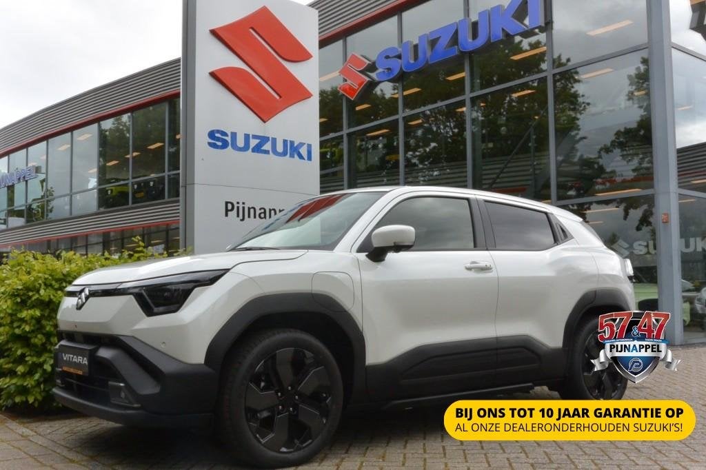 Suzuki E-VITARA STYLE 61 KWH AUTOMAAT - VOLLEDIG ELEKTRISCH, Automaat, Gebruikt, Met garantie (alle), Wit