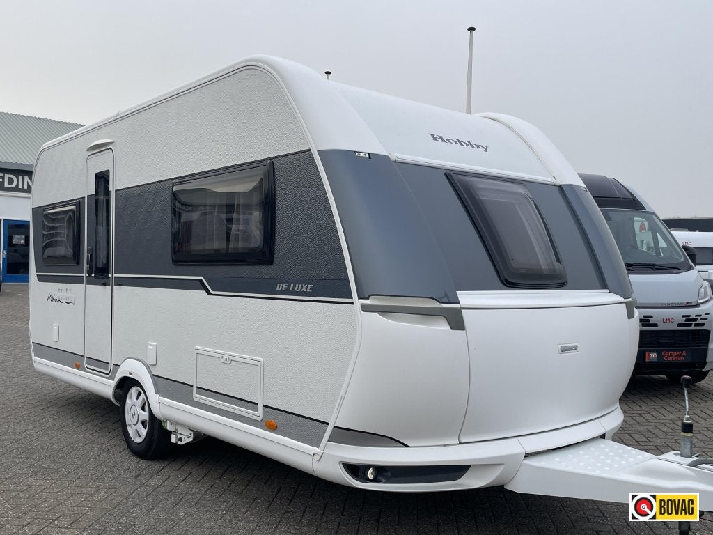 Hobby De Luxe 460 UFE MOVER/VOORTENT/NIEUWSTAAT, Caravans en Kamperen, Hobby, Bedrijf, 4 tot 5 meter, Tot en met 4