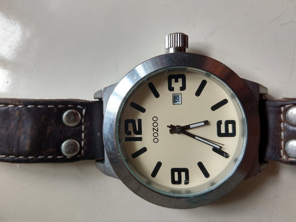 Oozo herenhorloge met lederen band. Horloge is in prima staa, Ophalen of Verzenden, Gebruikt, Leer, Overige merken