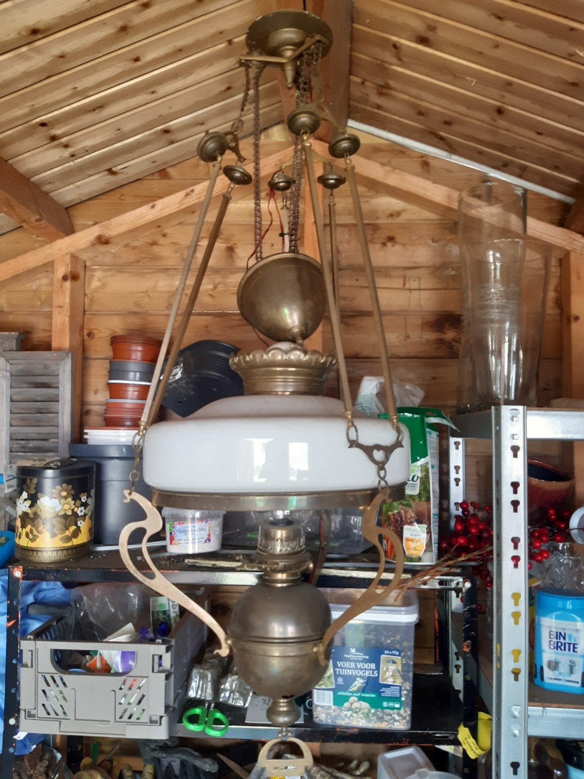 Oude koperen lamp, Ophalen