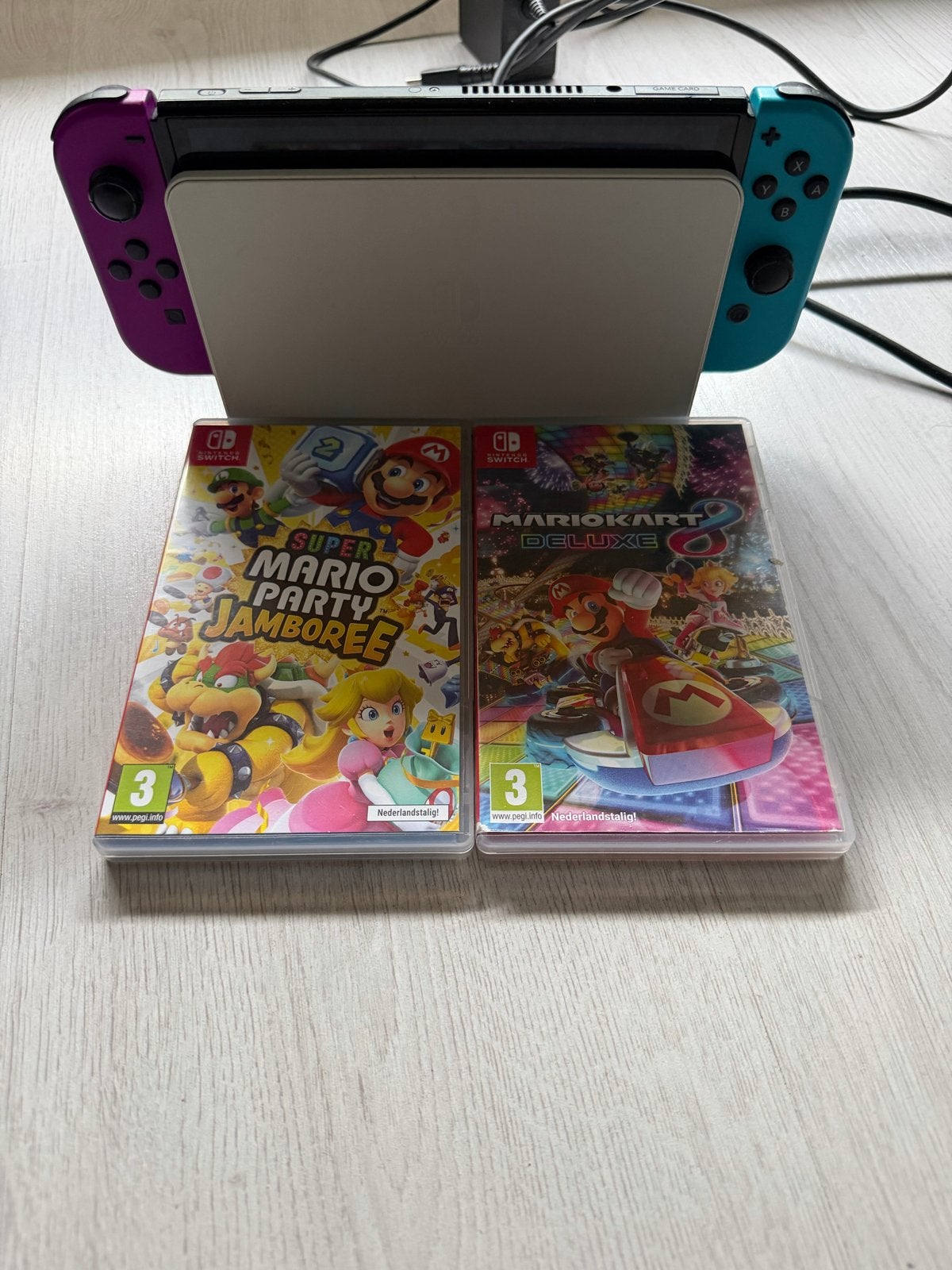 Nintendo Switch oled met 2 games, extra controllers, Verzenden, Switch Original, Met 3 controllers of meer, Gebruikt