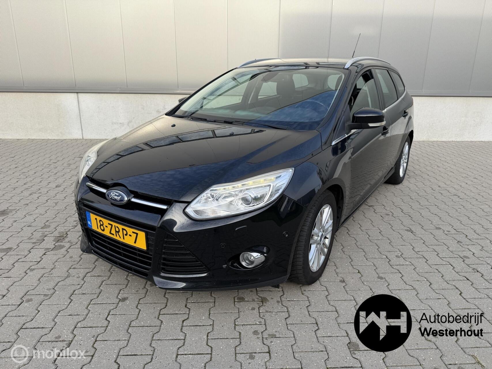 Ford Focus Wagon 1.0 EcoBoost Titanium|PARKEERSENSOREN|NAVI, Auto's, Euro 5, 125 pk, Gebruikt, Zwart
