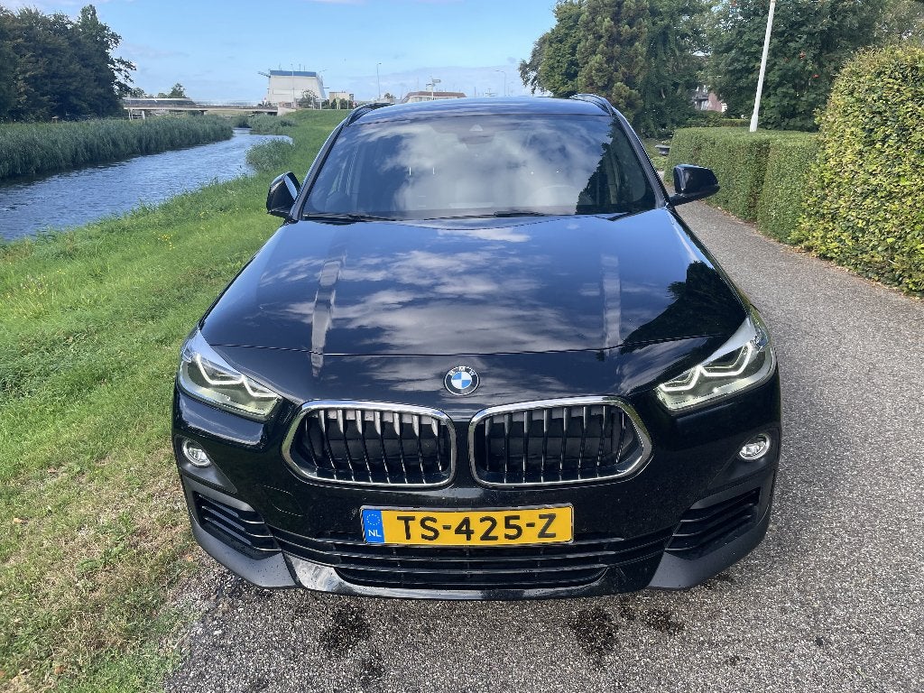 BMW X2 Sdrive18i 140pk Aut 2018 Zwart, Auto's, 4 cilinders, Zwart, Origineel Nederlands, 75 €/maand